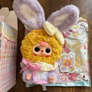 Adorable Plush Bunny Toy with Yellow and Purple Fur